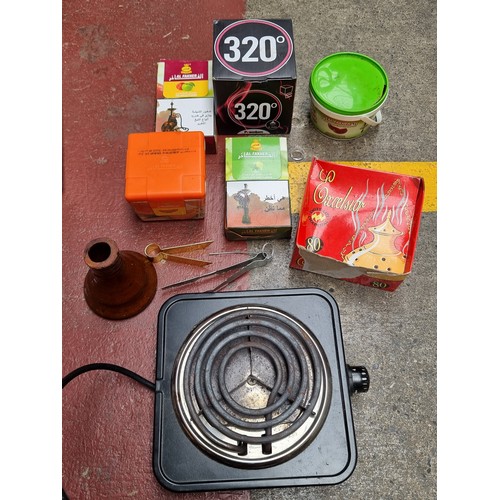 355 - A Hookah smoking water pipe with a large  box containing heating plate and flavoured tobaccos and ac... 