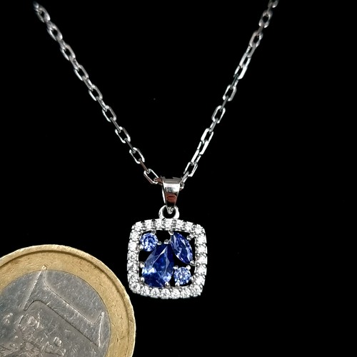 564 - A sterling silver Tanzanite pendant necklace with silver chain. Length 44cm. Old new stock