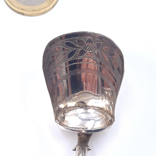 21 - A very unusual Georgian sugar spoon. Hallmarked Birmingham 1812. Dimensions 7cm length / sugar bowl ... 