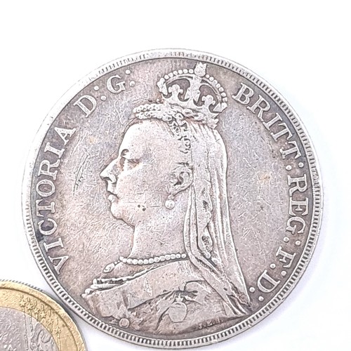 45 - A Queen Victoria 1889 silver crown in fine condition. Weight 27.92 grams.