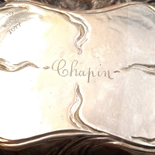 509 - Star Lot : A fine floral repoussé scallop edged tray marked sterling to base. Dimensions 17.14cm. We... 