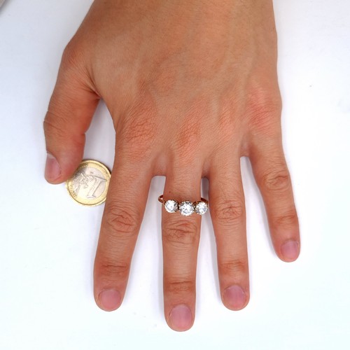 548 - A nice example of a nine carat gold three stone gem set ring. Stones large and bright. Size Z. Weigh... 