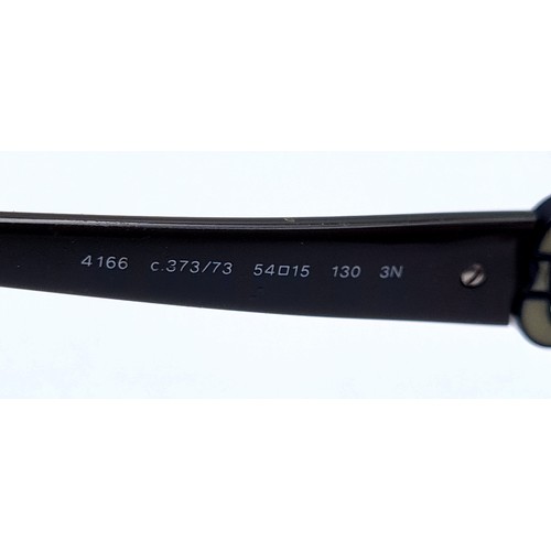 552 - A pair of designer Chanel sunglasses marked made in Italy with serial numbers to frame. Glasses and ... 