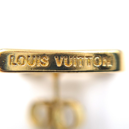 579 - A pair of designer Louis Vuitton stud earrings. Set with Louis Vuitton insignia mounts. Total weight... 