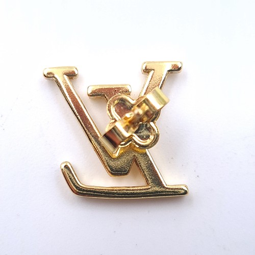 579 - A pair of designer Louis Vuitton stud earrings. Set with Louis Vuitton insignia mounts. Total weight... 