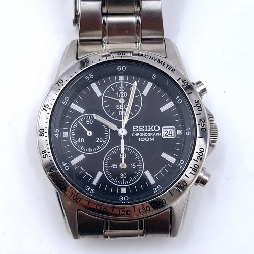 597 - A SEIKO large face chronograph wrist watch. Water resistant to 100m with original Seiko bracelet. We... 