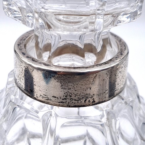 150 - A fabulous cut crystal decanter with original stopper and silver plated neck.