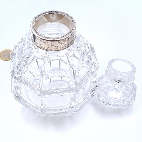 150 - A fabulous cut crystal decanter with original stopper and silver plated neck.