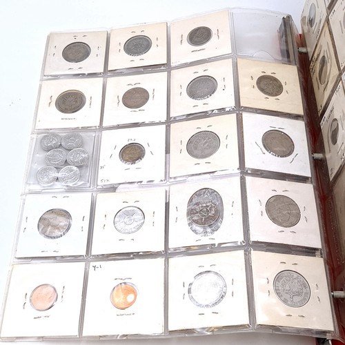 1182 - A superb world coin album including coinage from countries, Cuba, Bahamas, The British Virgin Isles,... 