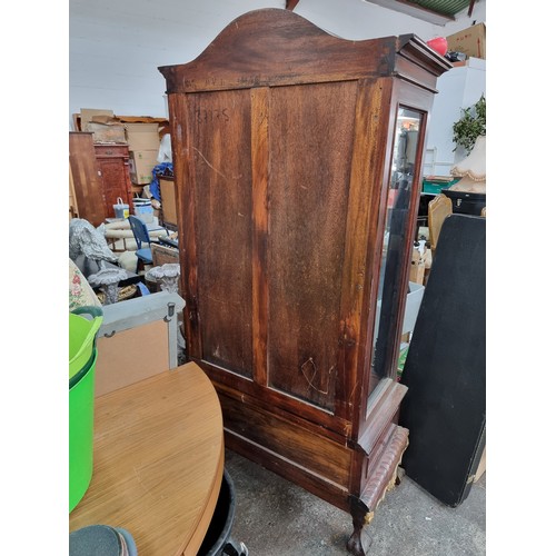 1180 - Star lot : A wonderful continental mahogany and gilt display cabinet. Features arched cornice with a... 