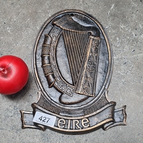 A heavy Bronzed plaque featuring a harp and "Eire" inscription, commemorating 1916-2016. 100 years of the Easter Rising.