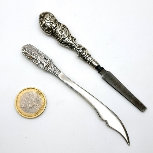 11 - Two Sterling silver items, including a hair straightener and a letter opener. Length - 11 cms.