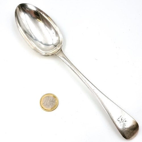 16 - A hallmarked Sheffield large sterling silver serving spoon. Length - 22 cms. Bowl - 8 x 4.5 cms. Wei... 