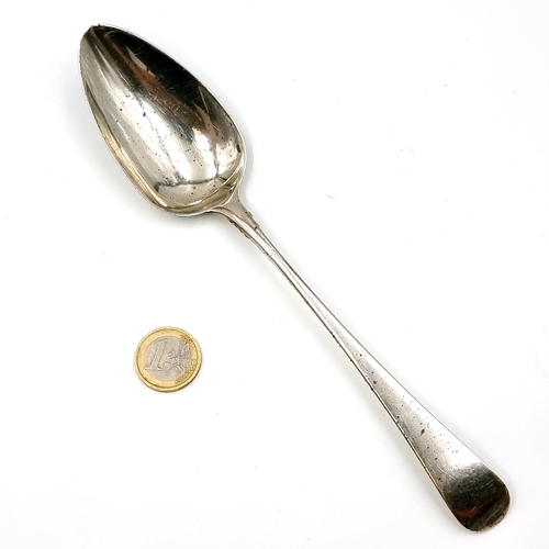 17 - A sterling silver serving spoon hallmarked London - 1803. Length - 21 cms. Bowl - 8 x 4 cms. Weight ... 