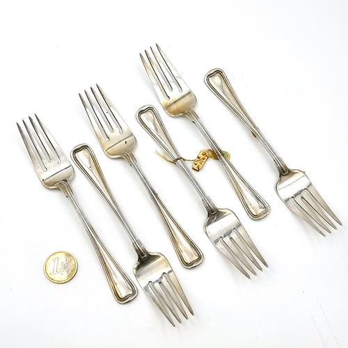 18 - A collection of six forks with fiddle pattern handles marked sterling and hallmarked Birmingham. Len... 