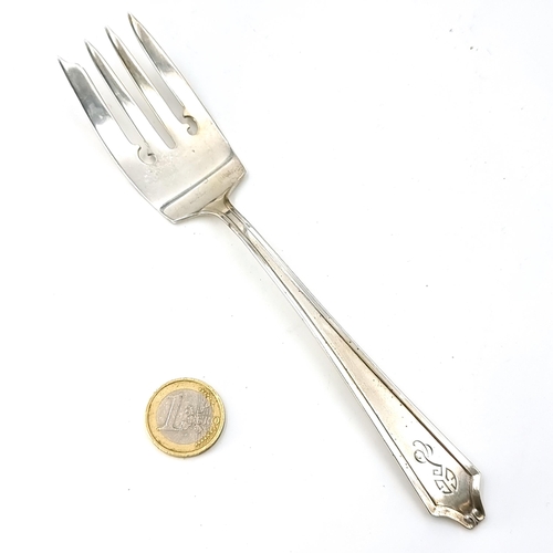 25 - A sterling silver pastry fork set with initialled finial handle. Length - 18 cms. Weight - 52.17 gra... 