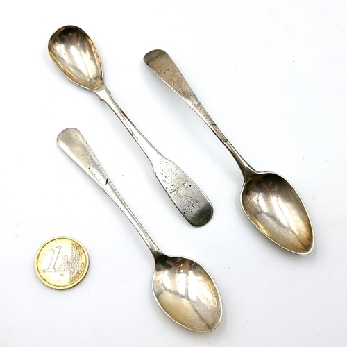 29 - A collection of three Irish spoons. Two with Sterling Silver  UK hallmarks together with an Irish si... 