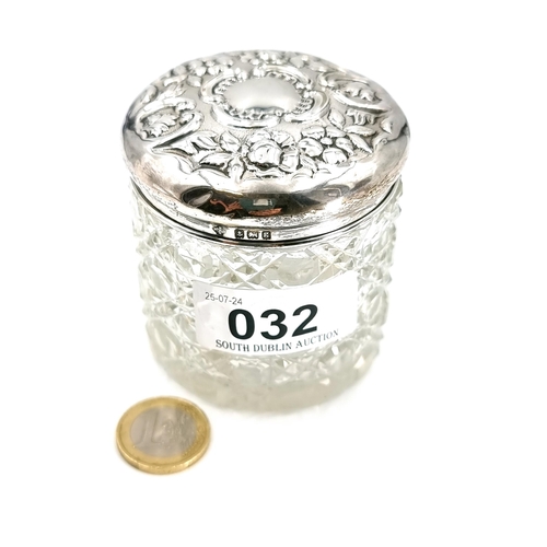 32 - A hob nail cut glass dressing table jar with sterling silver topped lid hallmarked Birmingham. Lid w... 