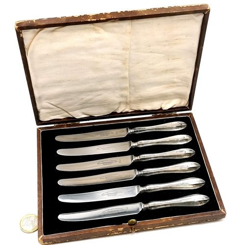 35 - A set of six sterling handled butter knives hallmarked Sheffield with Sheffield stainless steel blad... 