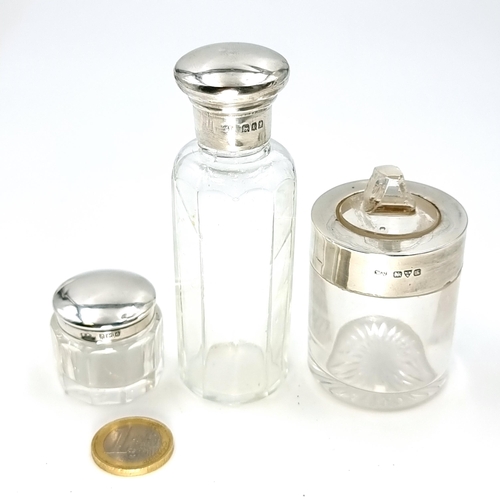 46 - A collection of silver topped dressing table jars with screw lids and collar. Two lids weight: 11 gr... 