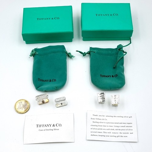 56 - Two pairs of genuine Tiffany sterling silver cuff - links in original boxes. Weight of cuff links - ... 