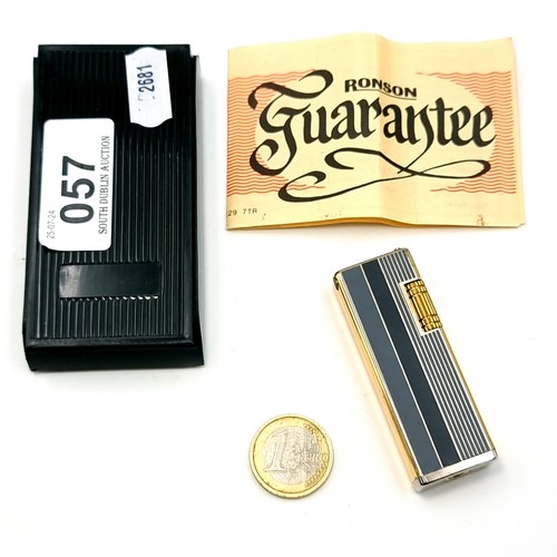 57 - A Ronson Grenadier lighter in original case and packaging.