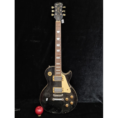 123 - Star Lot : A vintage collectible original Gibson Les Paul Electric Guitar in ebony finish.