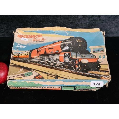 124 - A vintage collector's Brimtoy Brand Mechanical Train Set. British made. In its original packaging.