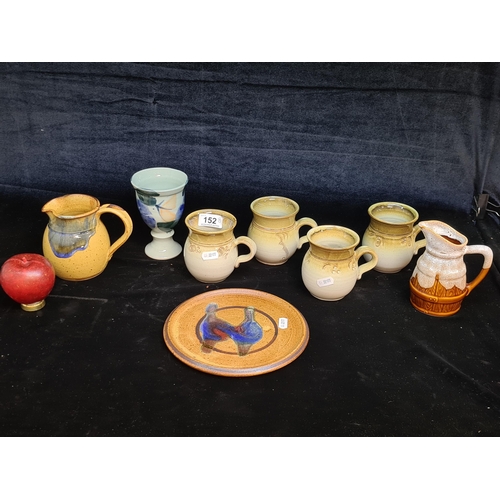 152 - A mixed lot of eight Studio art pottery items including some Kiltrea Bridge Enniscorthy examples.