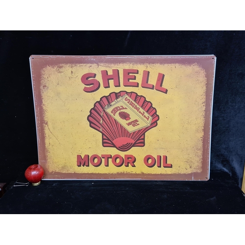 89 - A large printed metal wall sign of vintage advertising for Shell Motor Oil.  MM: 50cm X 70cm.