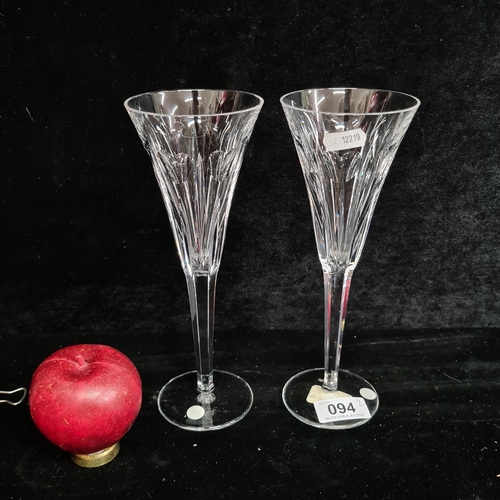 94 - A beautiful pair of large Waterford Crystal 'Love Toasting Flute Pair' with acid marks to base and o... 