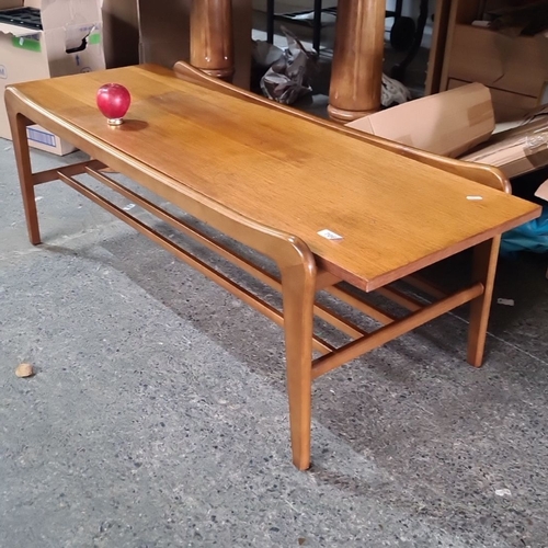 706 - Star lot : Stunning Mid-Century Modern teak coffee table with sleek, curved edges and slatted lower ... 