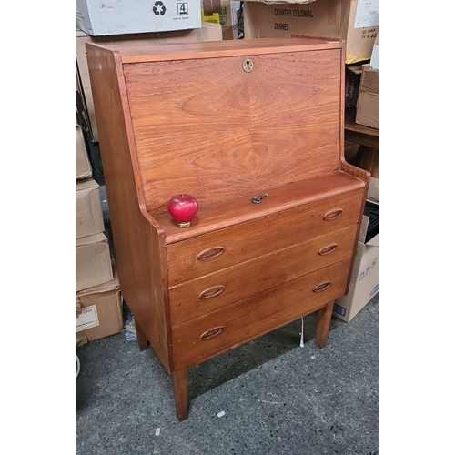 708 - Star lot : A super Mid-Century Modern teak writing desk with drop-front, internal compartments, and ... 