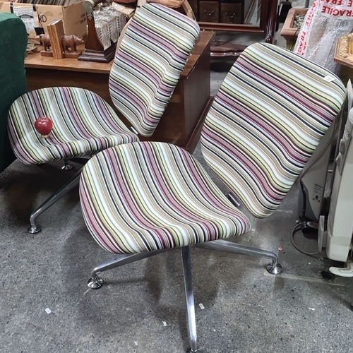 739 - Star Lot : Pair of mid-century designer Orange Box modern swivel chairs with multicolored striped up... 