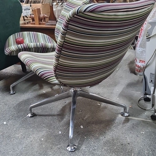 739 - Star Lot : Pair of mid-century designer Orange Box modern swivel chairs with multicolored striped up... 