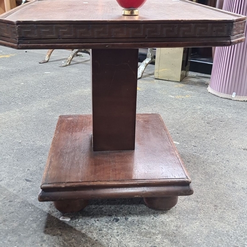 748 - Early 20th-century wooden side table with Greek key design, solid pedestal base, and octagonal top. ... 