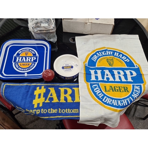 755 - Four Items of 'HARP Irish Lager' items including branded serving tray, Wade Regicor ashtray, bar tow... 