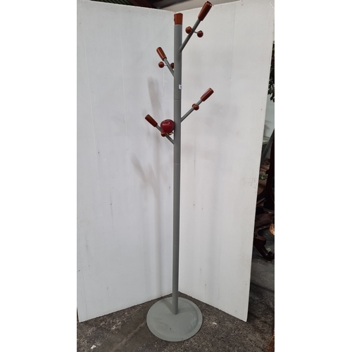 767 - A Metal coat rack with grey painted body and accented hooks.