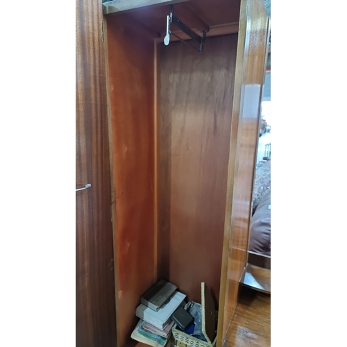 801 - Star Lot: Vintage wooden wardrobe with mirrored door, built-in drawers, and a hanging rail. Likely M... 