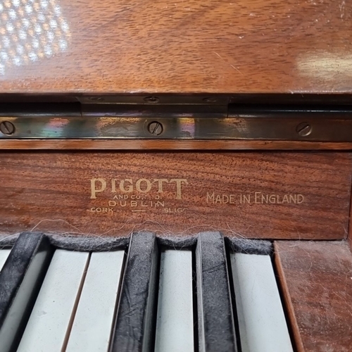 802 - Star Lot: An elegant Kingscourt piano with stool, manufactured by Pigott and Company, Dublin. Made i... 