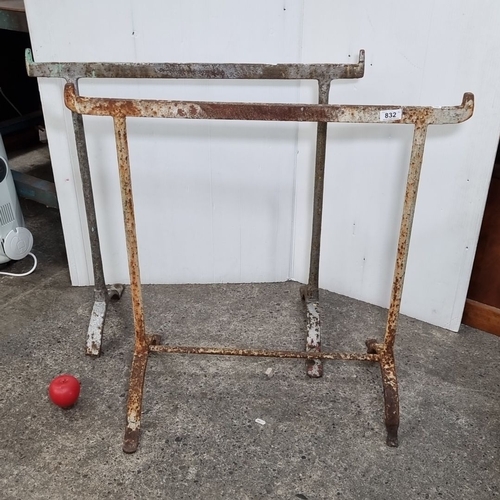 832 - Pair of vintage cast iron industrial table bases with a weathered patina.