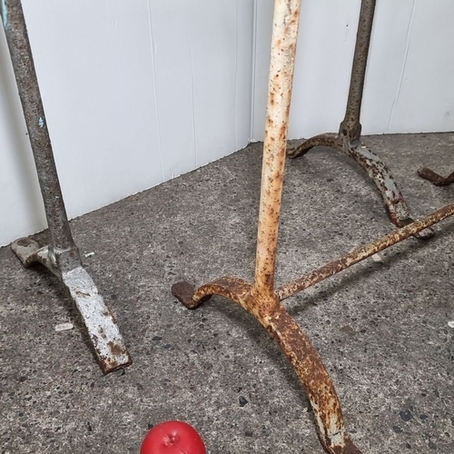 832 - Pair of vintage cast iron industrial table bases with a weathered patina.