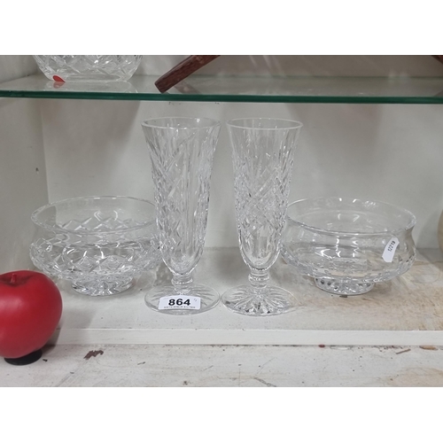 864 - A lot of four Waterford Crystal pieces including two bud vases, and two pedestal bowls. All in good ... 