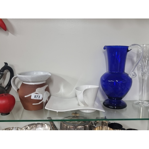 873 - Three items including an Irish made Stephen Pearse jug along with a Vileroy and Boch coffee mug and ... 