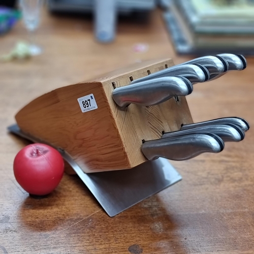 897 - A superb Rostock knife block set. Complete with seven various sized knives. A wonderful addition to ... 