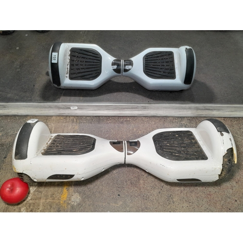 931 - An unbranded electric hoverboard in a white finish, No charger.