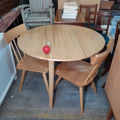 961 - A lovey wooden Scandinavian style breakfast table along with two coordinating chairs. Super conditio... 