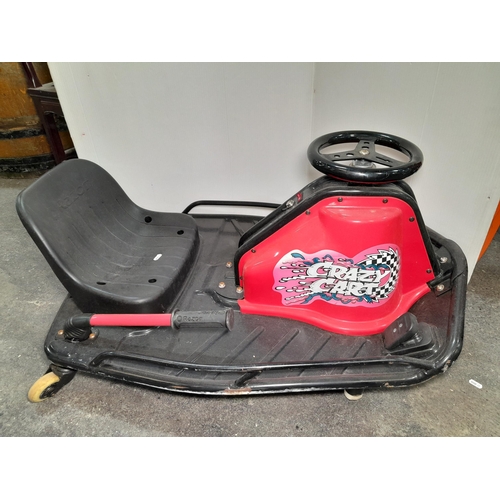 969 - Star lot : A Razor Crazy electric Go Kart featuring 40minute ride time and 360c drift drive along wi... 