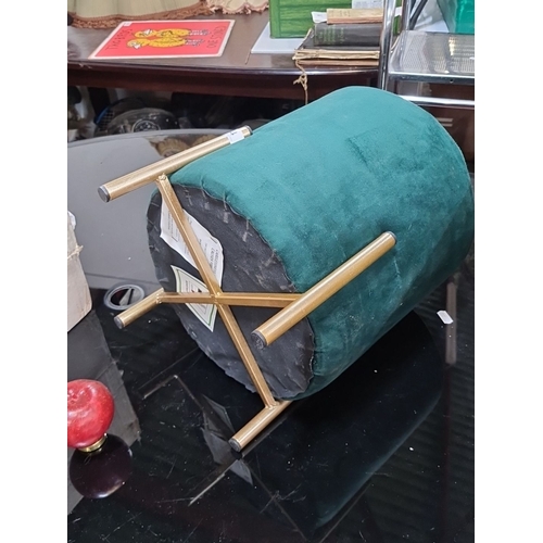 774 - Green velvet upholstered cylindrical stool with gold-tone metal legs.