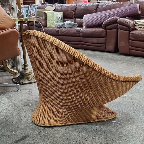 782 - Mid-Century Modern natural woven lotus wicker chair, featuring a unique sculptural design. This piec... 